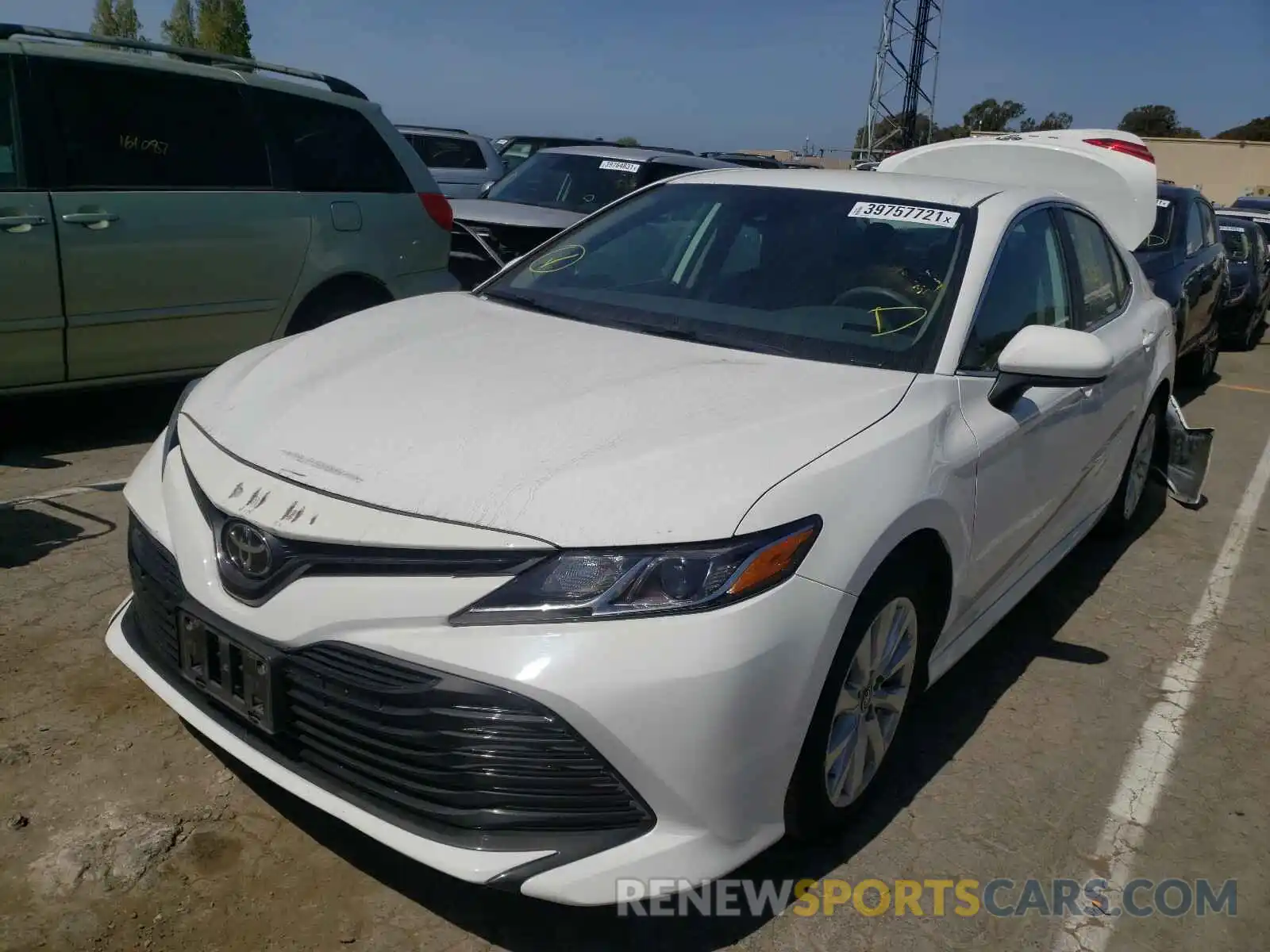 2 Photograph of a damaged car 4T1B11HK6KU784337 TOYOTA CAMRY 2019