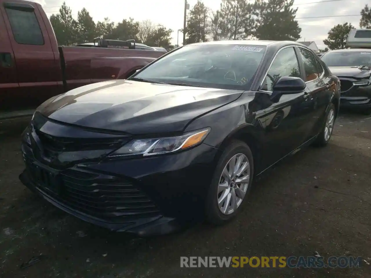 2 Photograph of a damaged car 4T1B11HK6KU785522 TOYOTA CAMRY 2019