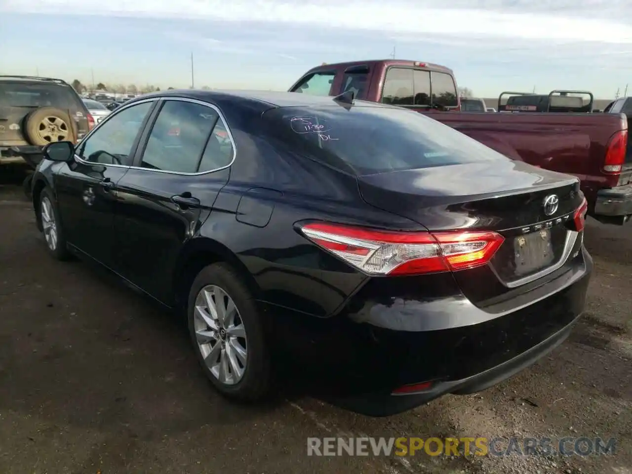 3 Photograph of a damaged car 4T1B11HK6KU785522 TOYOTA CAMRY 2019