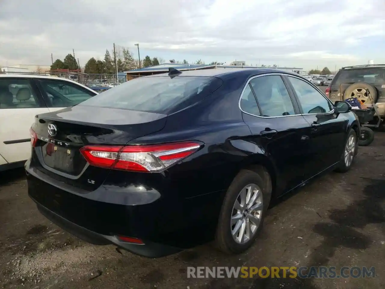 4 Photograph of a damaged car 4T1B11HK6KU785522 TOYOTA CAMRY 2019