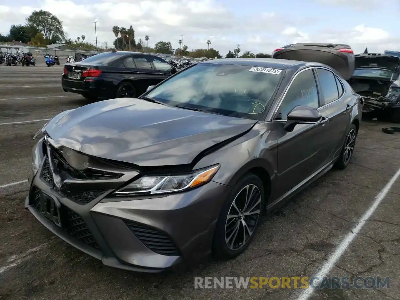 2 Photograph of a damaged car 4T1B11HK6KU787299 TOYOTA CAMRY 2019