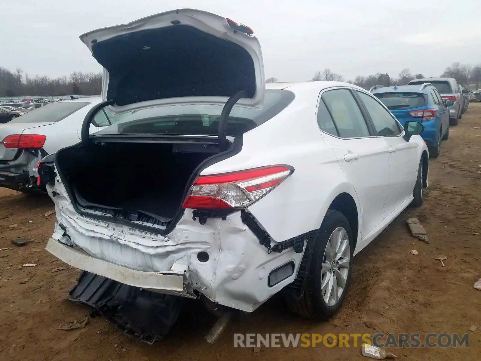 4 Photograph of a damaged car 4T1B11HK6KU792373 TOYOTA CAMRY 2019