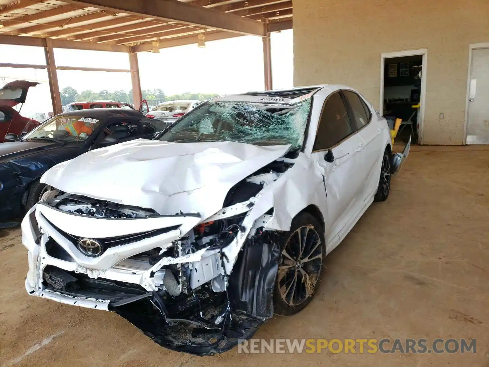 2 Photograph of a damaged car 4T1B11HK6KU799582 TOYOTA CAMRY 2019