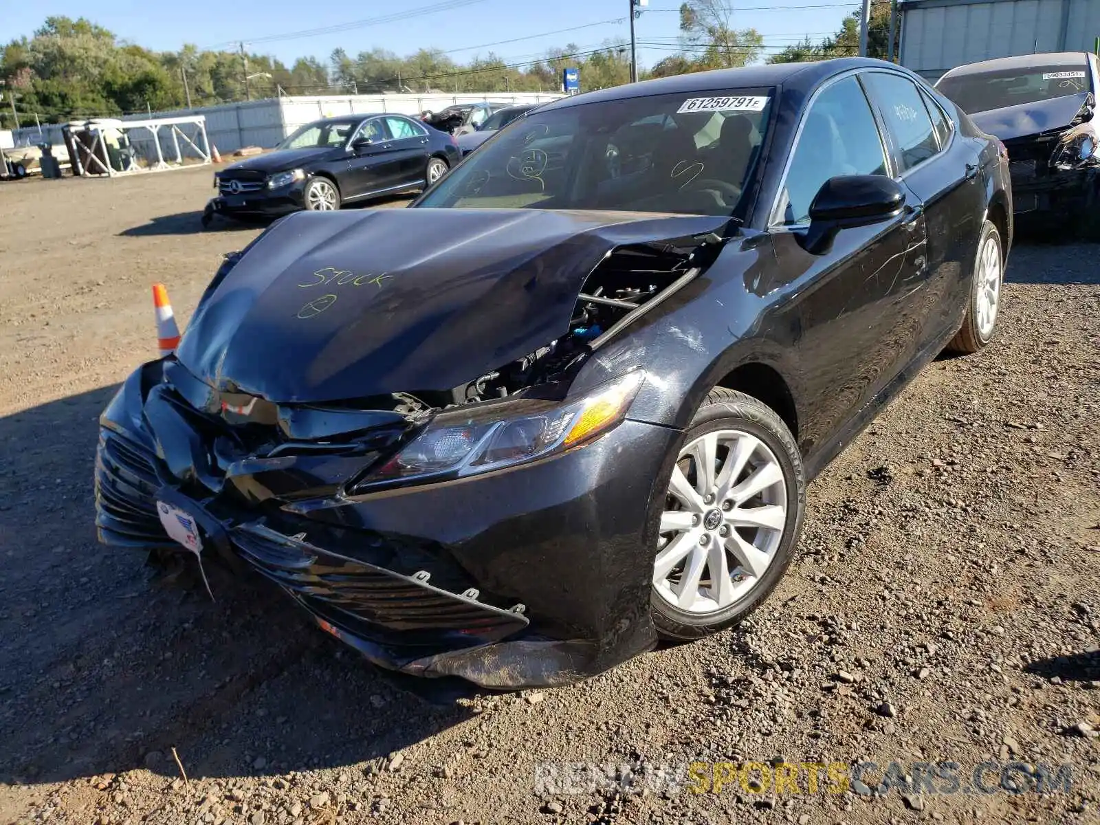 2 Photograph of a damaged car 4T1B11HK6KU803419 TOYOTA CAMRY 2019