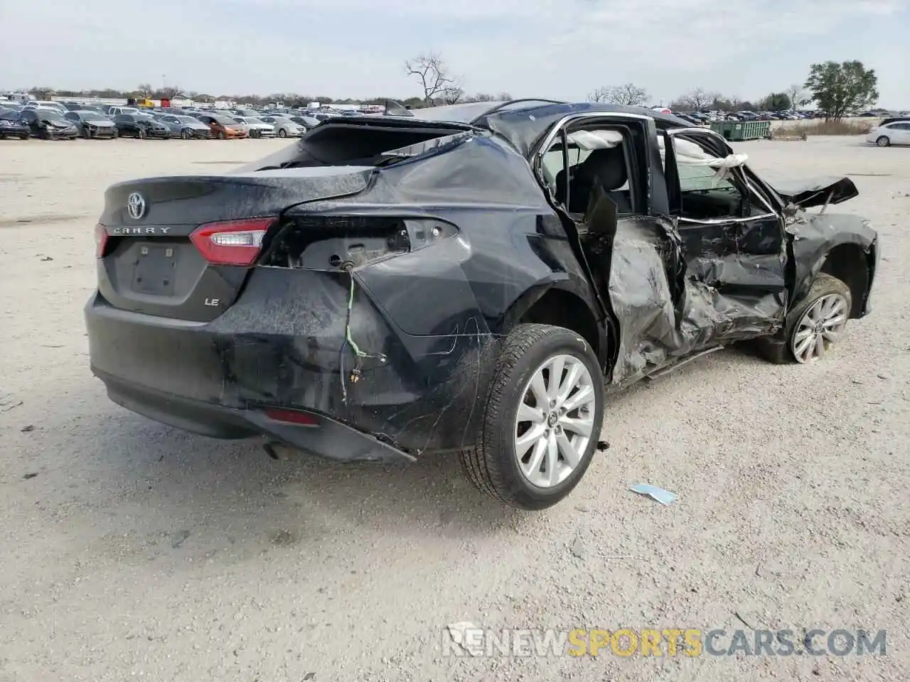 4 Photograph of a damaged car 4T1B11HK6KU807325 TOYOTA CAMRY 2019