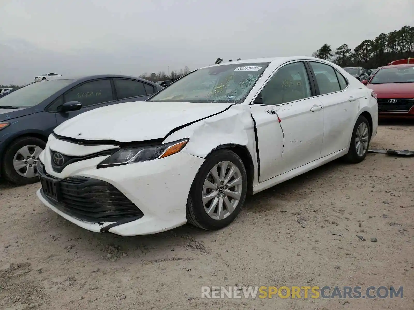 2 Photograph of a damaged car 4T1B11HK6KU807521 TOYOTA CAMRY 2019