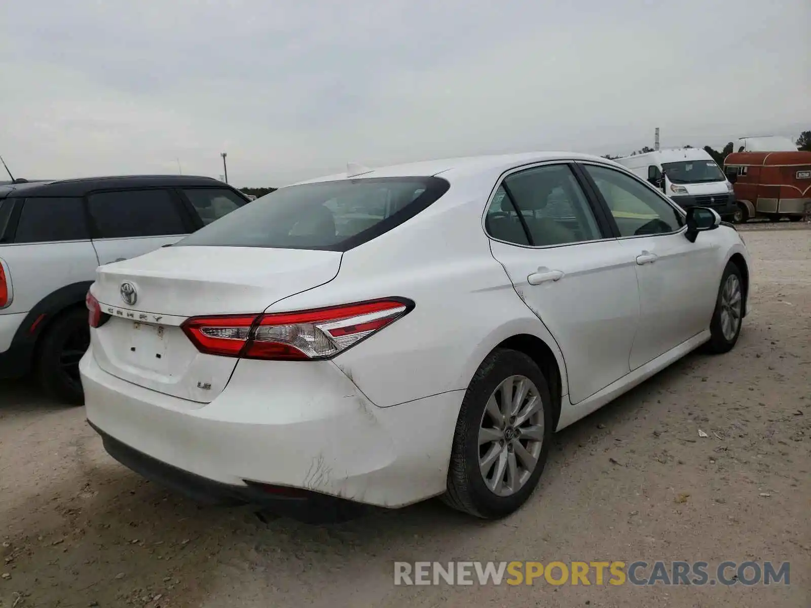 4 Photograph of a damaged car 4T1B11HK6KU807521 TOYOTA CAMRY 2019