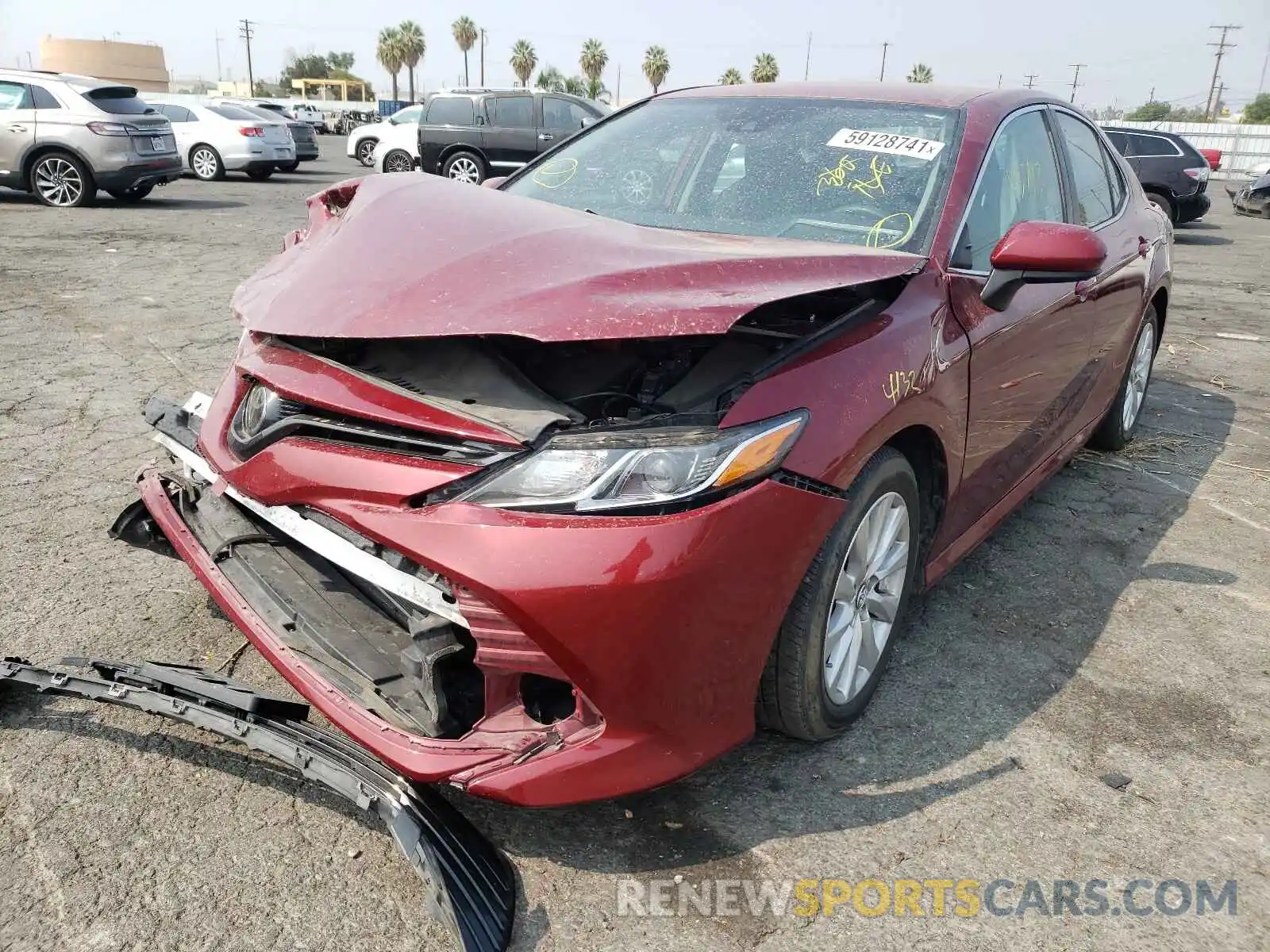 2 Photograph of a damaged car 4T1B11HK6KU812427 TOYOTA CAMRY 2019