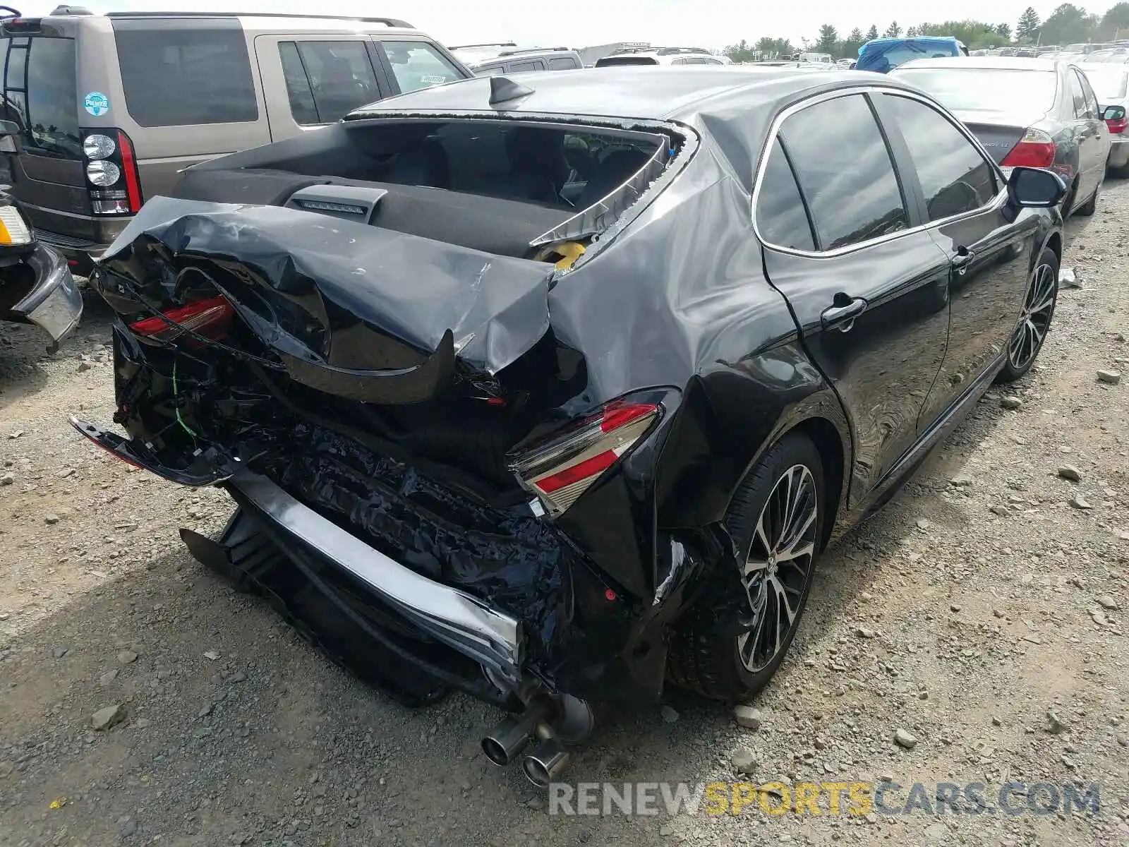 4 Photograph of a damaged car 4T1B11HK6KU812458 TOYOTA CAMRY 2019