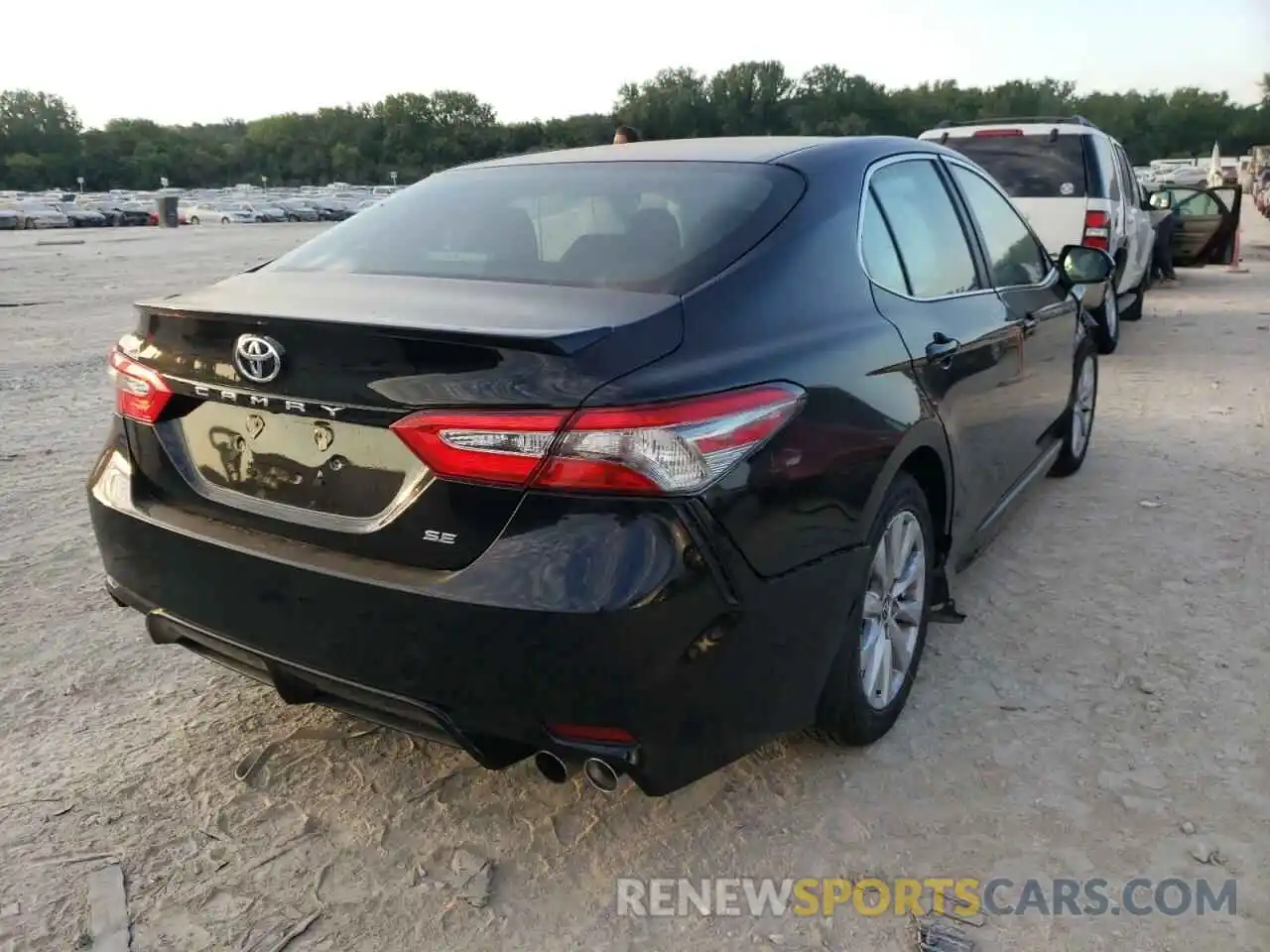 4 Photograph of a damaged car 4T1B11HK6KU813495 TOYOTA CAMRY 2019