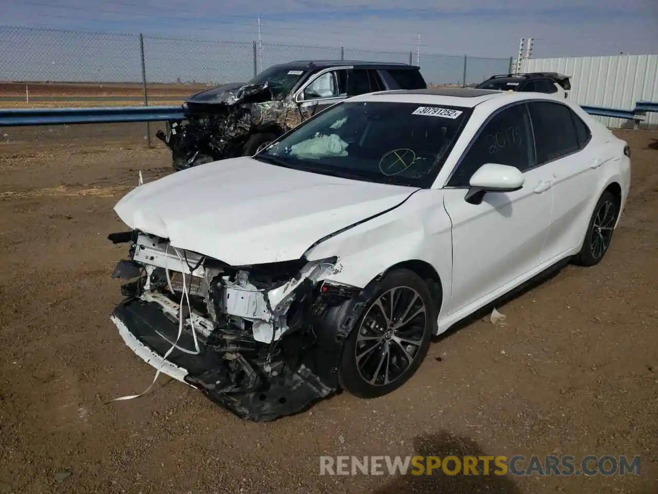 2 Photograph of a damaged car 4T1B11HK6KU815943 TOYOTA CAMRY 2019