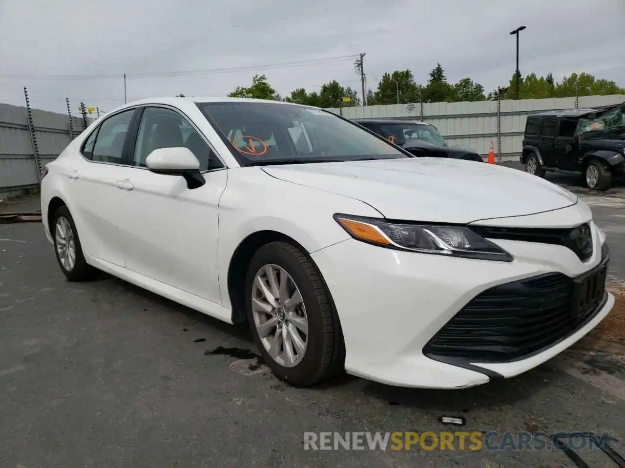 1 Photograph of a damaged car 4T1B11HK6KU817627 TOYOTA CAMRY 2019