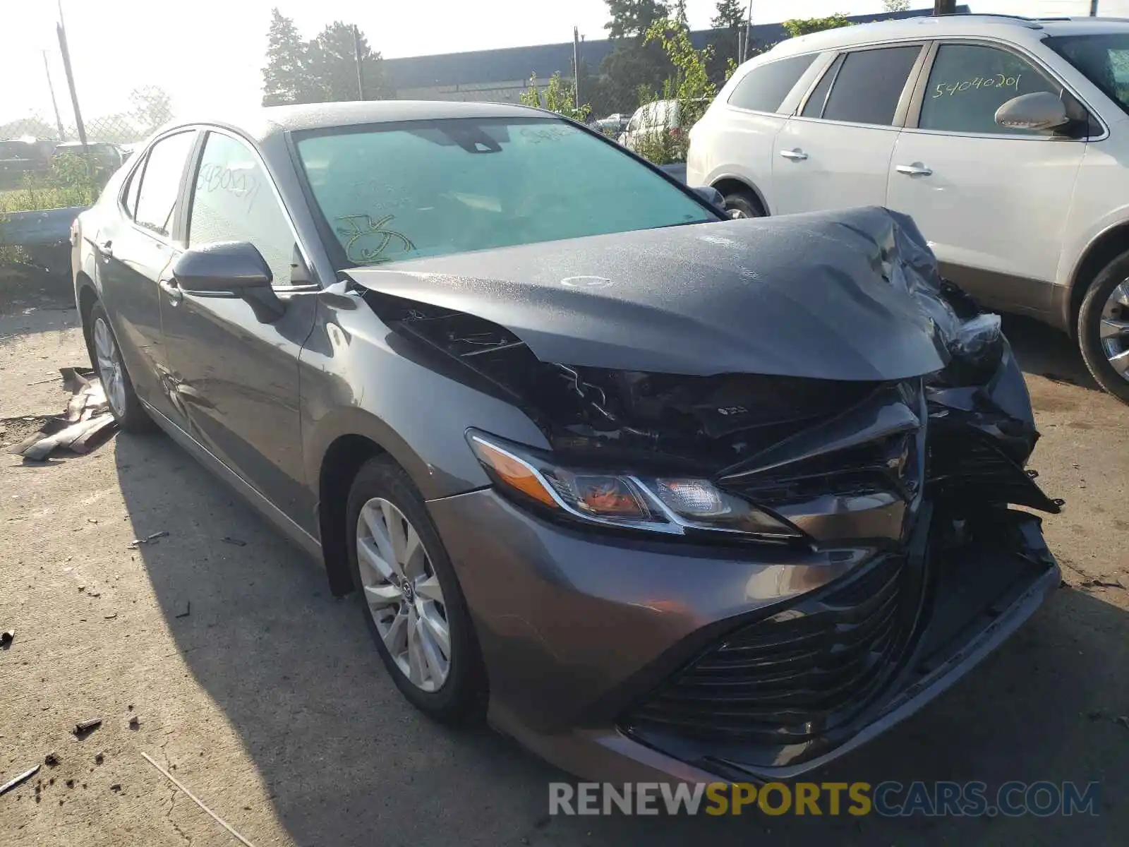 1 Photograph of a damaged car 4T1B11HK6KU817675 TOYOTA CAMRY 2019