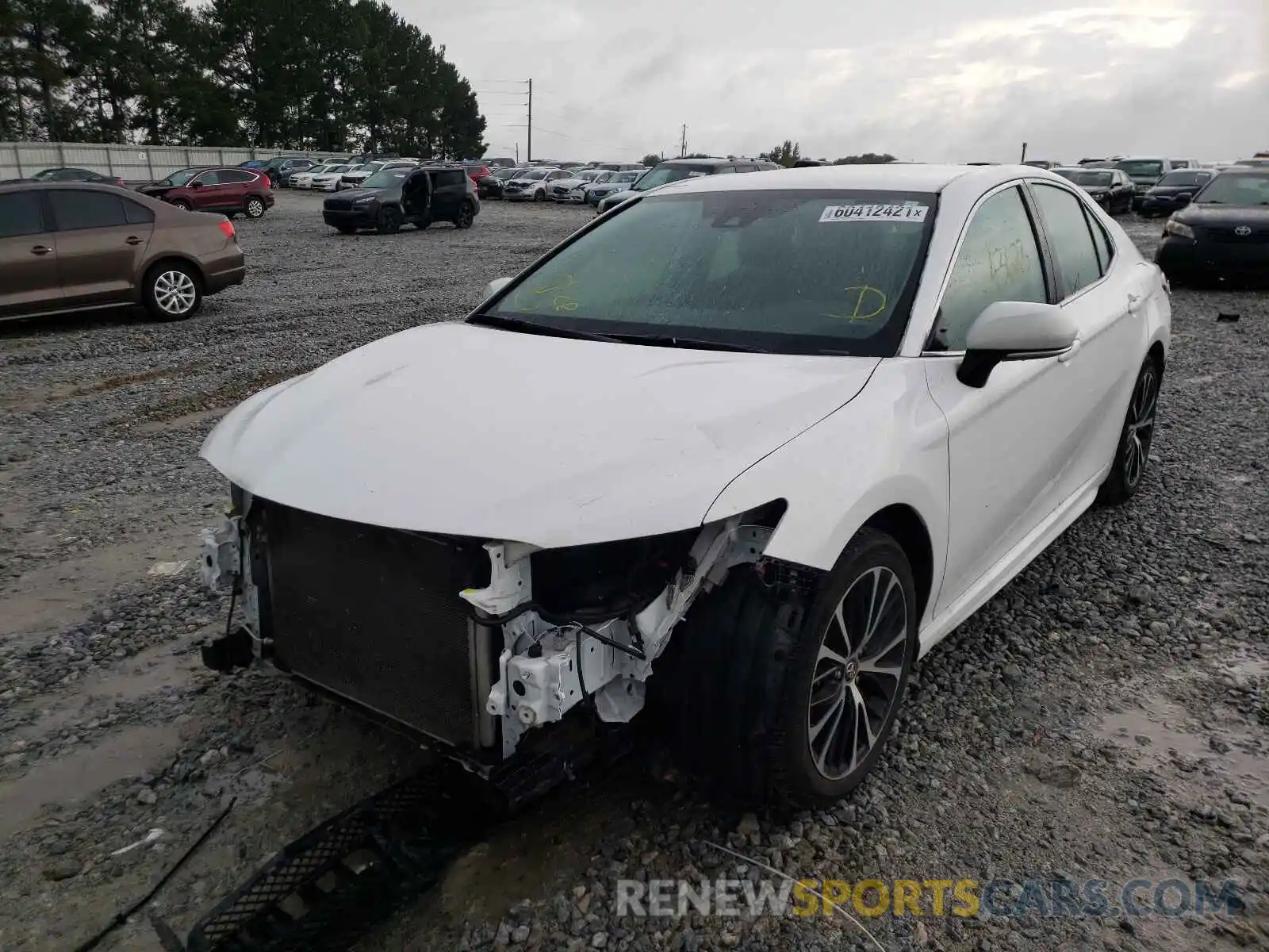 2 Photograph of a damaged car 4T1B11HK6KU818115 TOYOTA CAMRY 2019