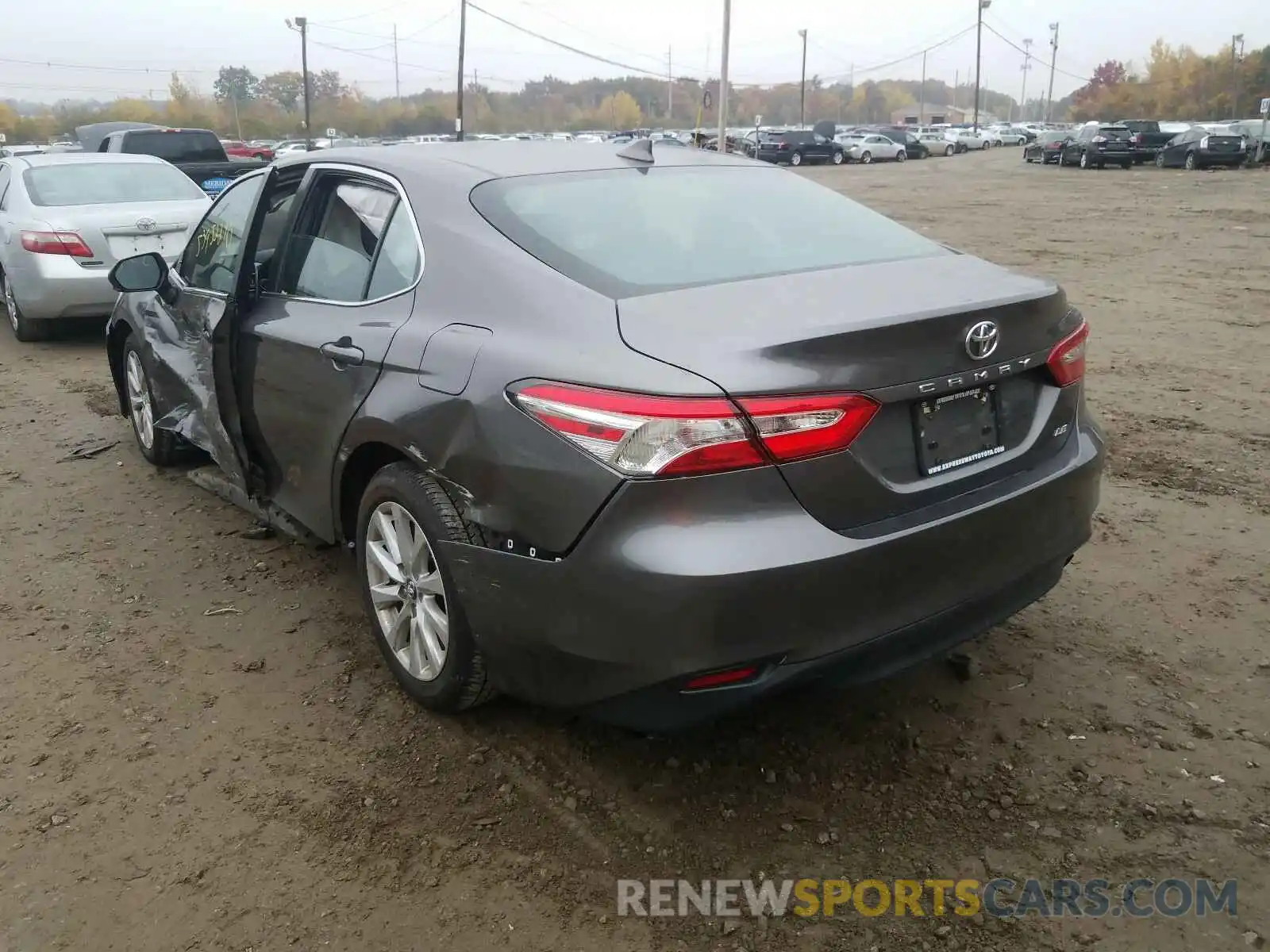 3 Photograph of a damaged car 4T1B11HK6KU818793 TOYOTA CAMRY 2019