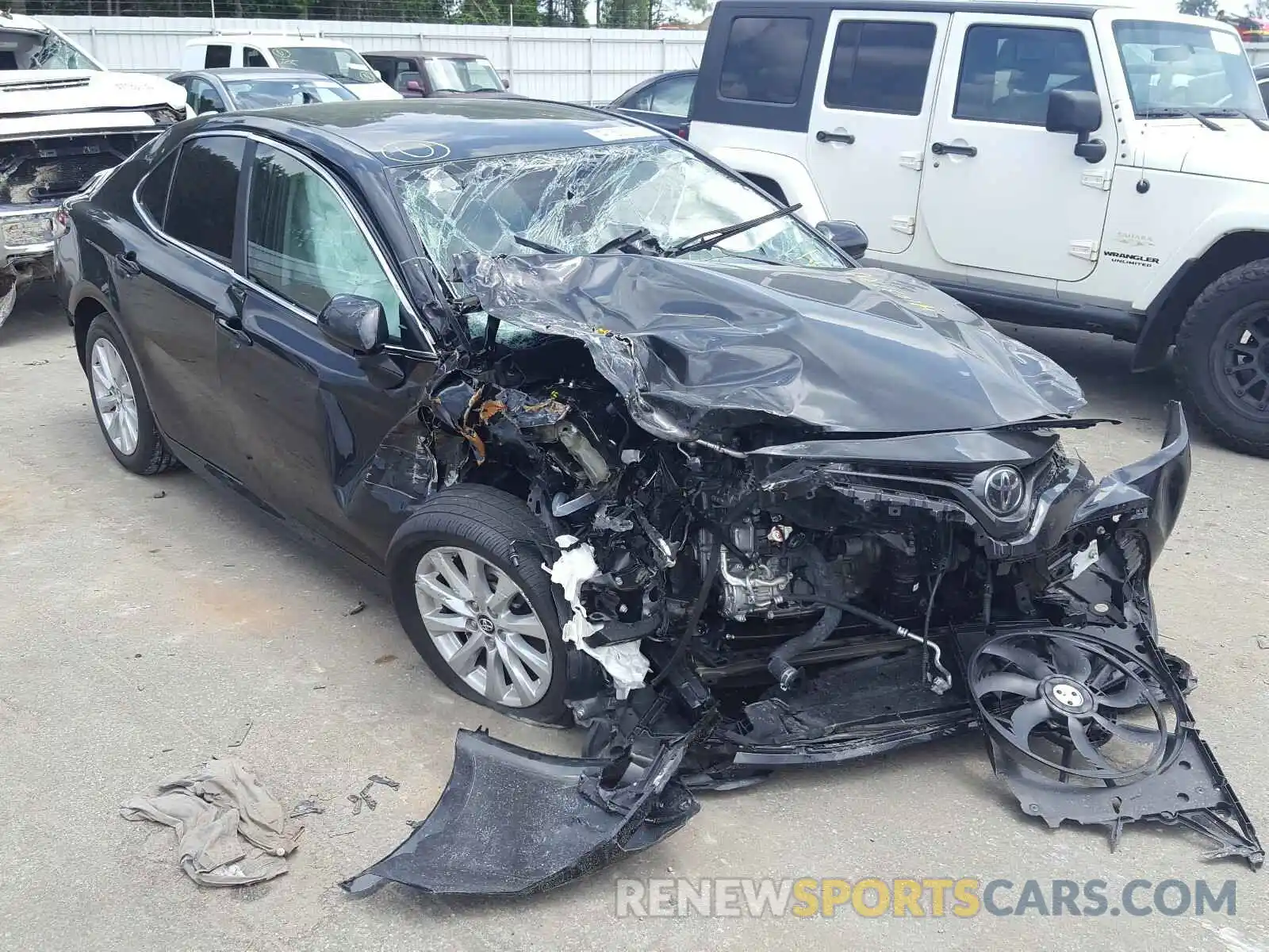 1 Photograph of a damaged car 4T1B11HK6KU819023 TOYOTA CAMRY 2019