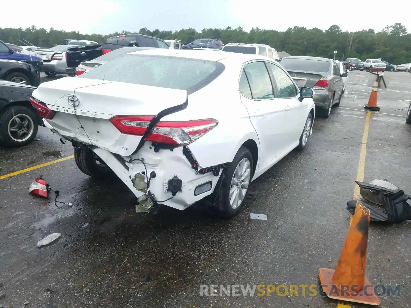 4 Photograph of a damaged car 4T1B11HK6KU821225 TOYOTA CAMRY 2019