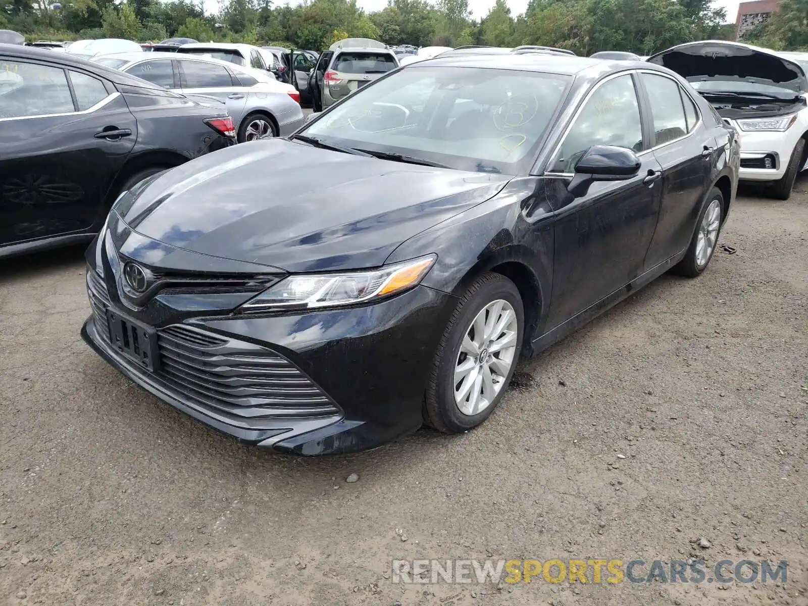 2 Photograph of a damaged car 4T1B11HK6KU822911 TOYOTA CAMRY 2019