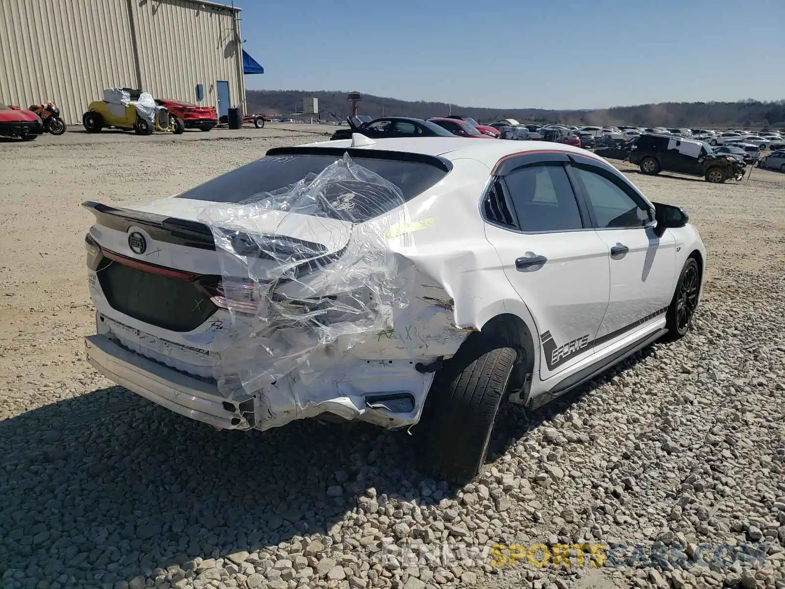 4 Photograph of a damaged car 4T1B11HK6KU823797 TOYOTA CAMRY 2019