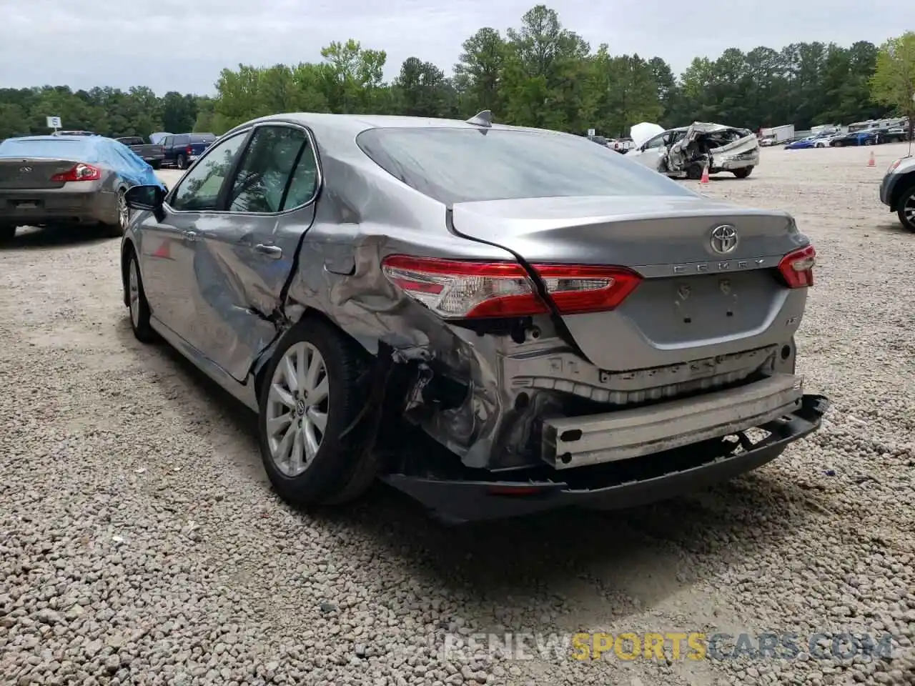 3 Photograph of a damaged car 4T1B11HK6KU825825 TOYOTA CAMRY 2019