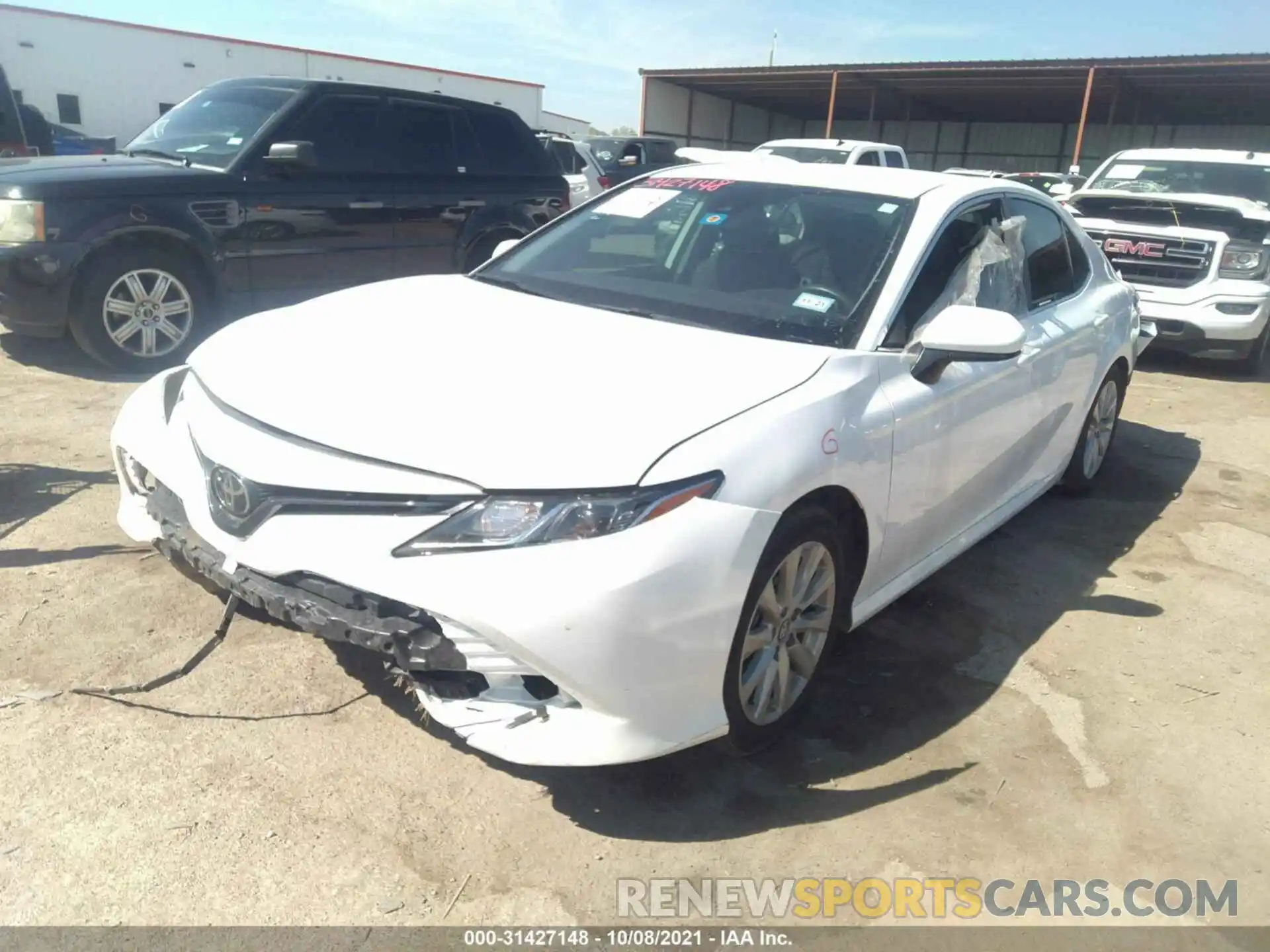 2 Photograph of a damaged car 4T1B11HK6KU831656 TOYOTA CAMRY 2019