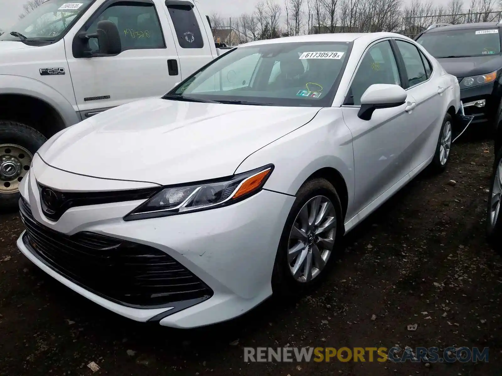 2 Photograph of a damaged car 4T1B11HK6KU832564 TOYOTA CAMRY 2019