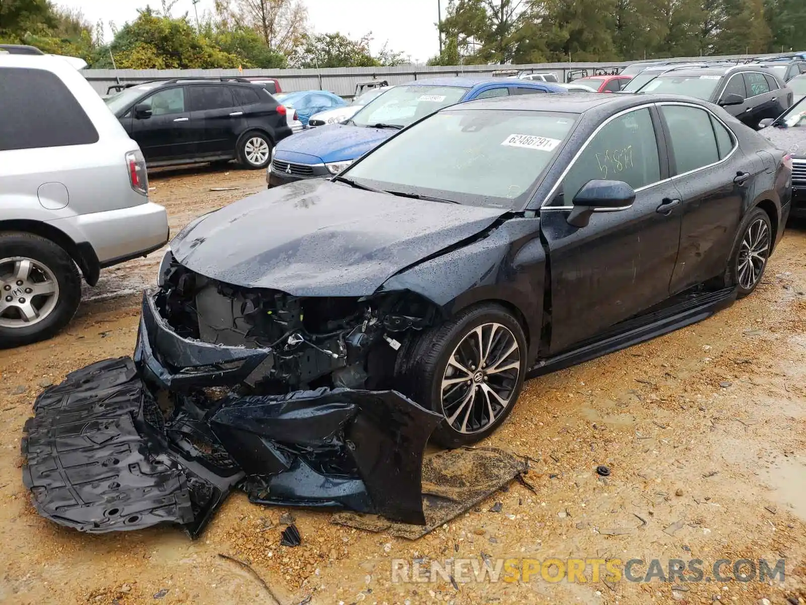 2 Photograph of a damaged car 4T1B11HK6KU837277 TOYOTA CAMRY 2019