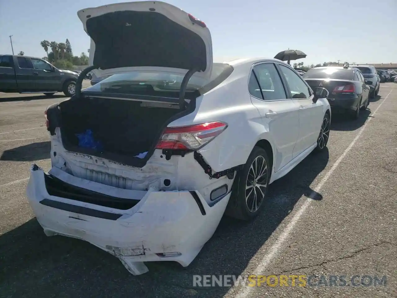 4 Photograph of a damaged car 4T1B11HK6KU837375 TOYOTA CAMRY 2019