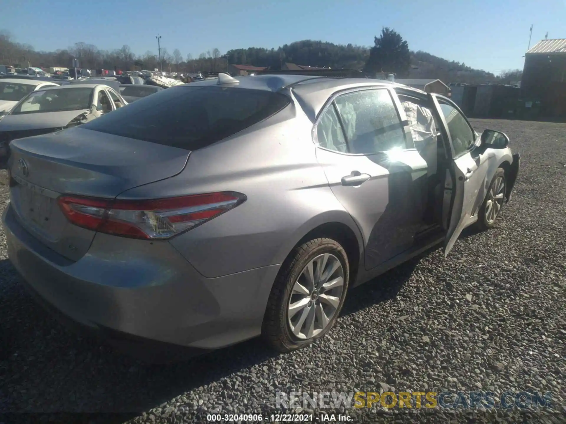 4 Photograph of a damaged car 4T1B11HK6KU843791 TOYOTA CAMRY 2019