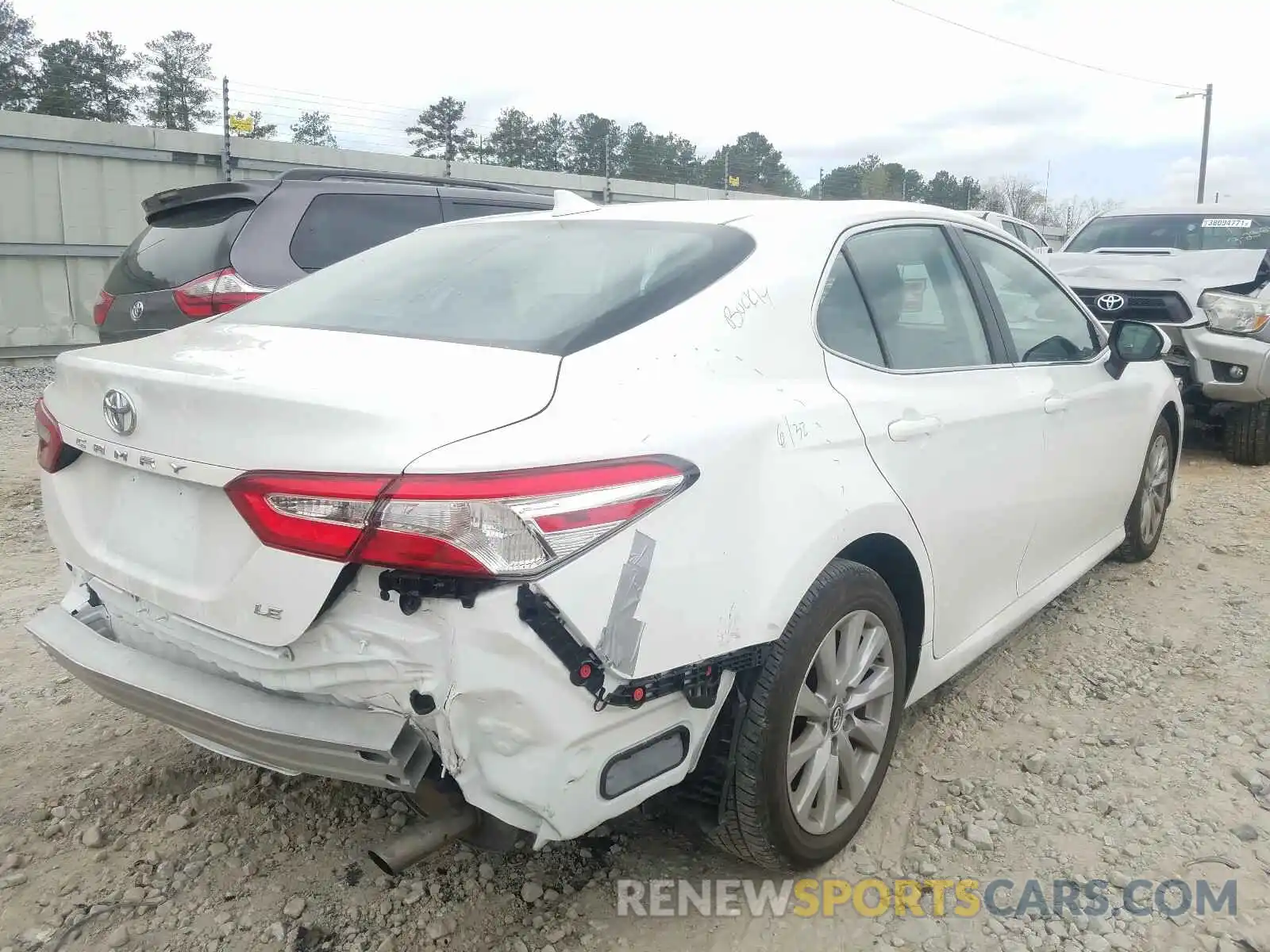 4 Photograph of a damaged car 4T1B11HK6KU851163 TOYOTA CAMRY 2019