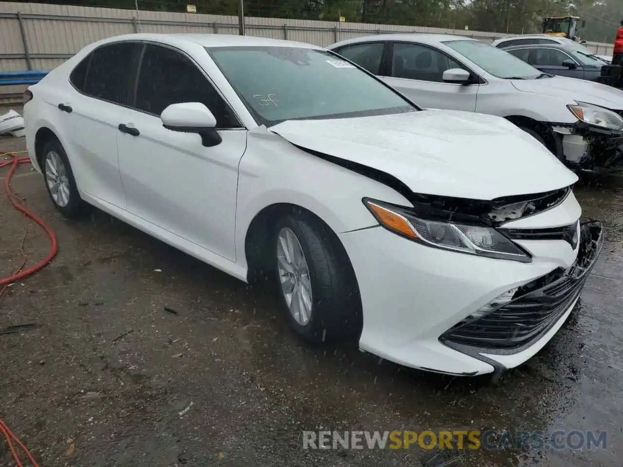 4 Photograph of a damaged car 4T1B11HK6KU851177 TOYOTA CAMRY 2019