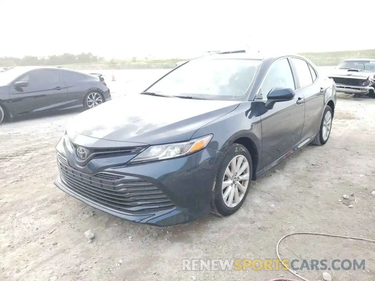 2 Photograph of a damaged car 4T1B11HK6KU856766 TOYOTA CAMRY 2019