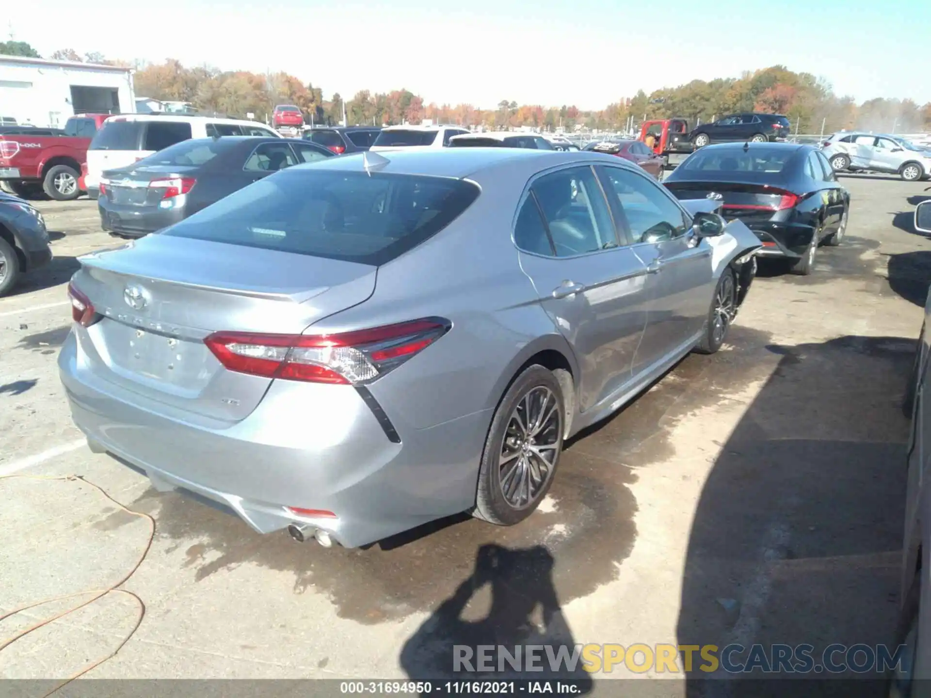 4 Photograph of a damaged car 4T1B11HK7KU159977 TOYOTA CAMRY 2019