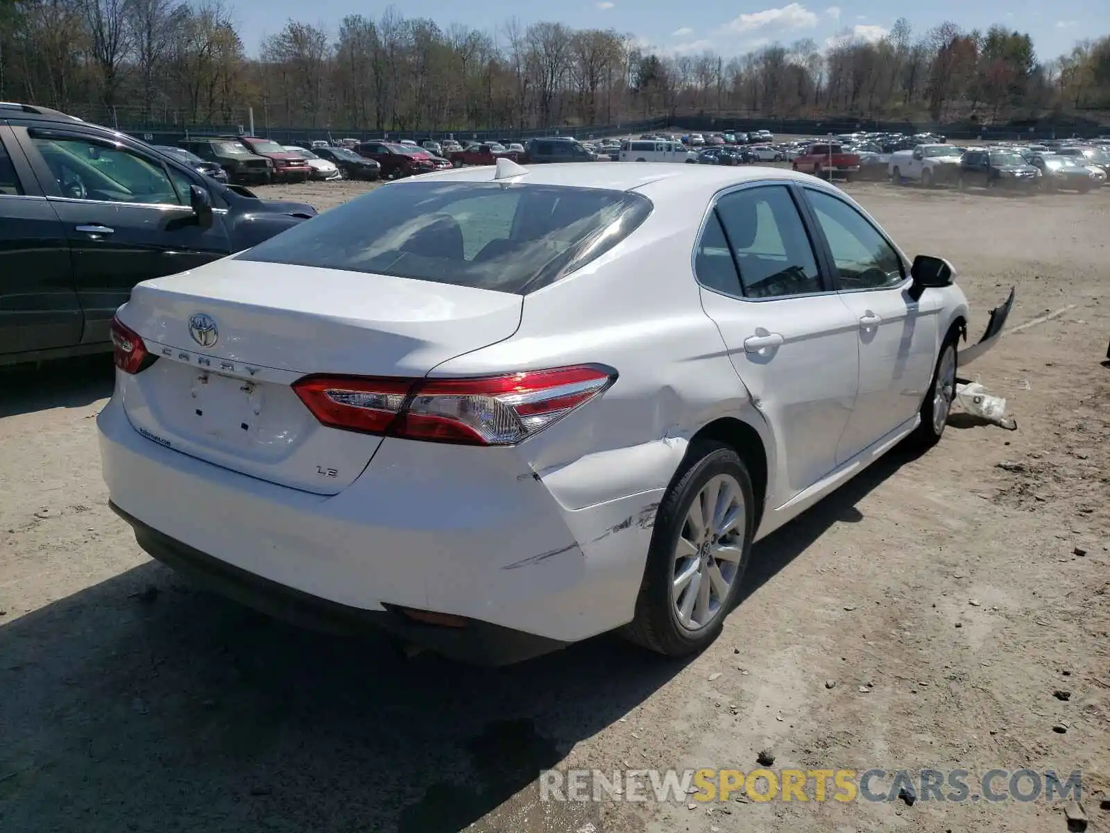 4 Photograph of a damaged car 4T1B11HK7KU162751 TOYOTA CAMRY 2019