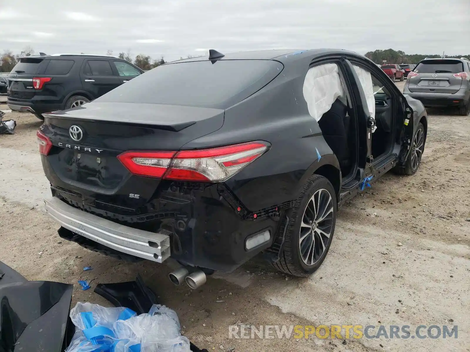 4 Photograph of a damaged car 4T1B11HK7KU163155 TOYOTA CAMRY 2019