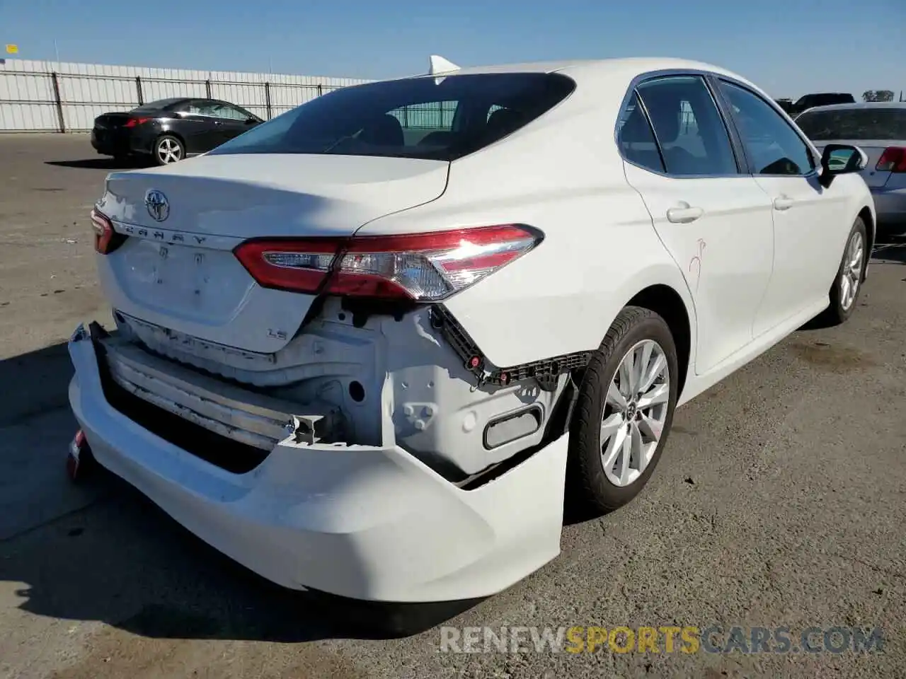 4 Photograph of a damaged car 4T1B11HK7KU164032 TOYOTA CAMRY 2019