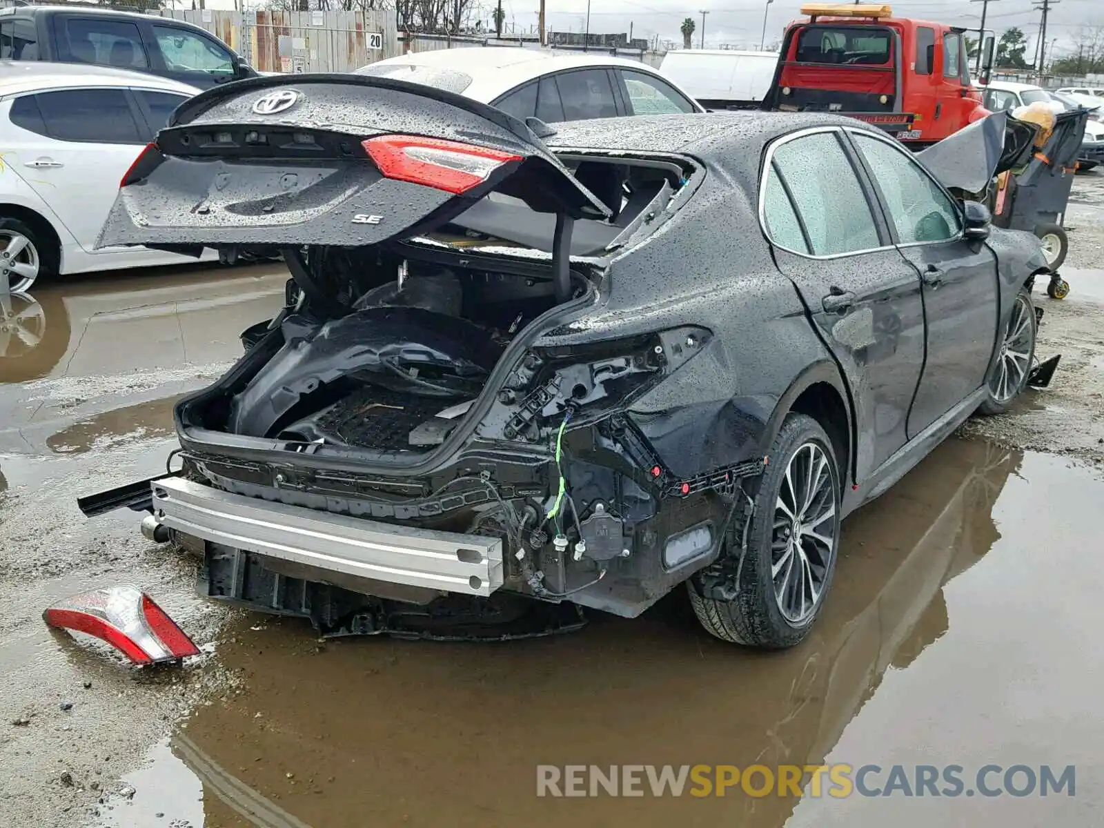 4 Photograph of a damaged car 4T1B11HK7KU164354 TOYOTA CAMRY 2019