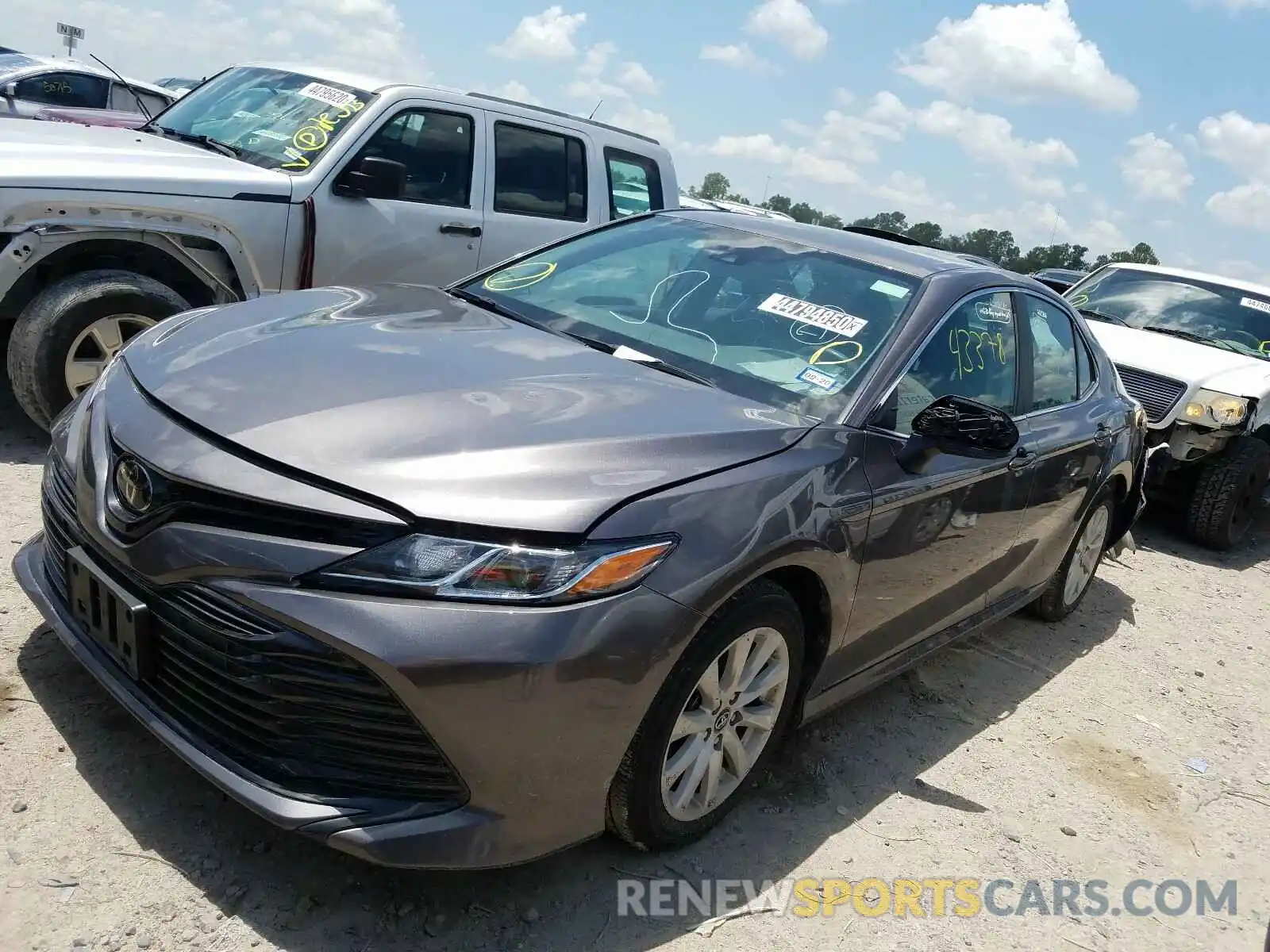 2 Photograph of a damaged car 4T1B11HK7KU167139 TOYOTA CAMRY 2019