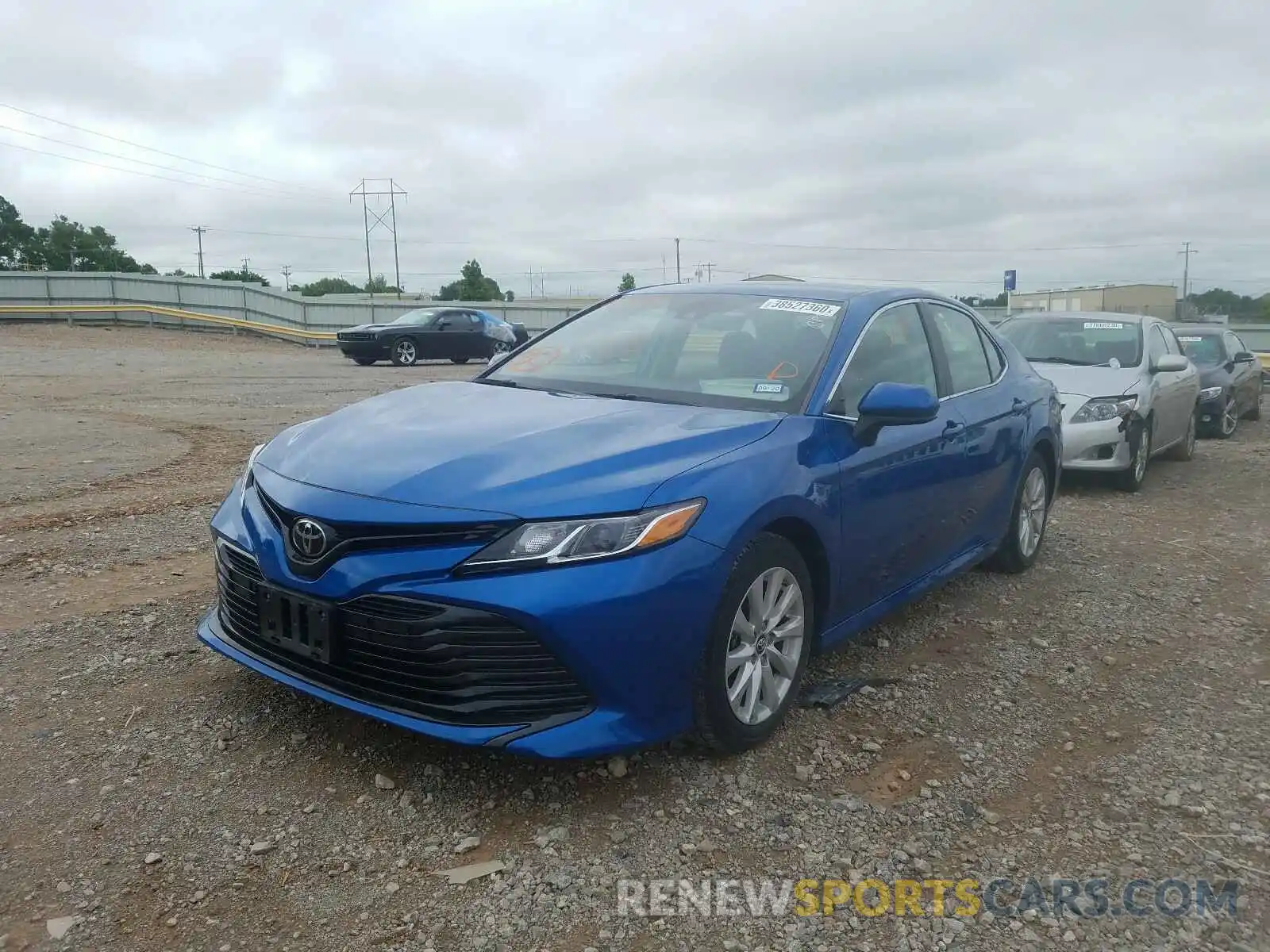 2 Photograph of a damaged car 4T1B11HK7KU167495 TOYOTA CAMRY 2019