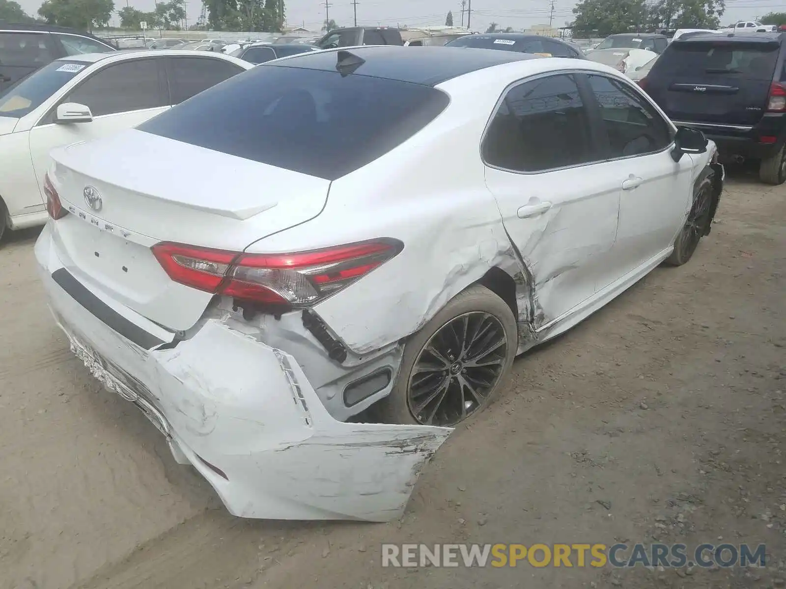 4 Photograph of a damaged car 4T1B11HK7KU174012 TOYOTA CAMRY 2019