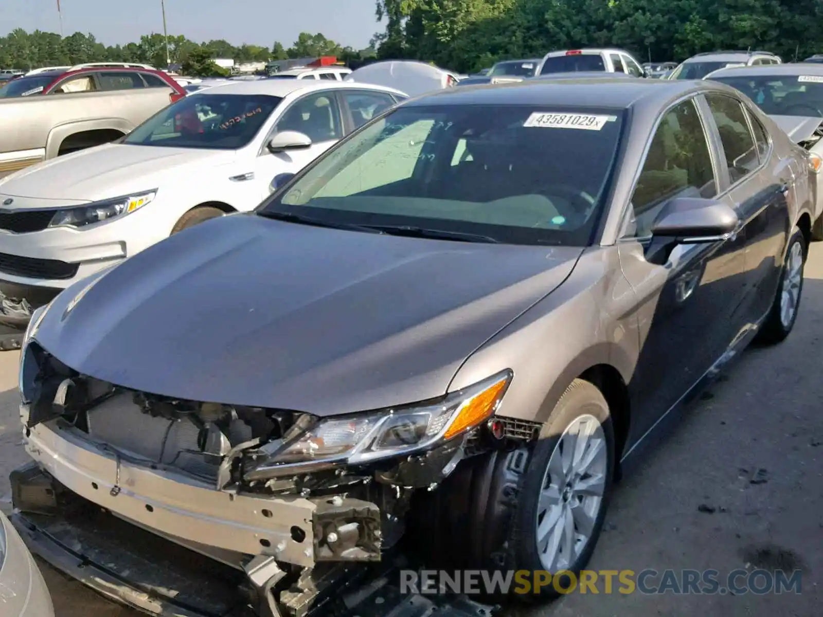 2 Photograph of a damaged car 4T1B11HK7KU184457 TOYOTA CAMRY 2019