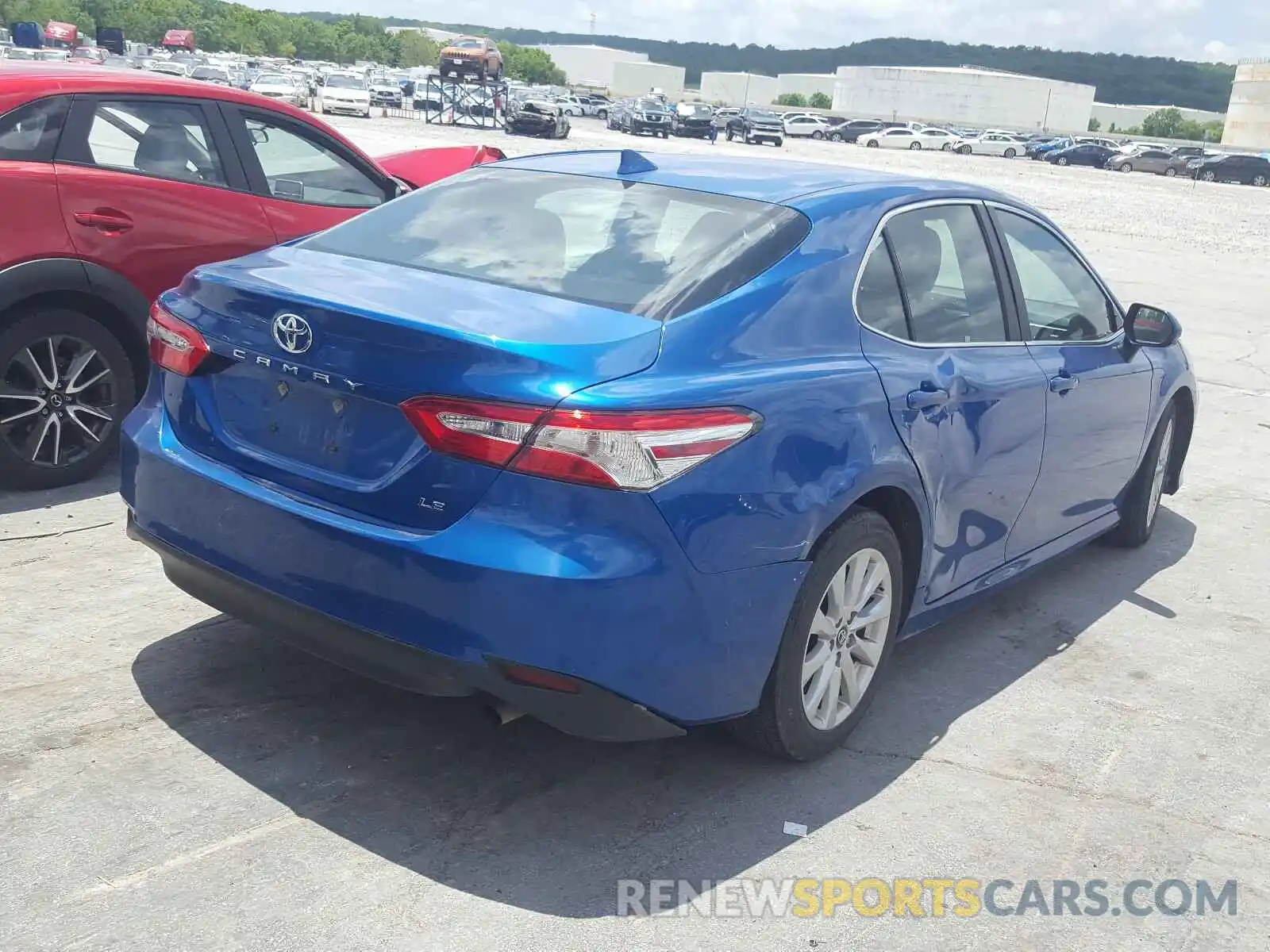 4 Photograph of a damaged car 4T1B11HK7KU193451 TOYOTA CAMRY 2019