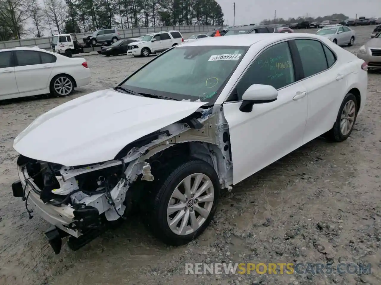 2 Photograph of a damaged car 4T1B11HK7KU194924 TOYOTA CAMRY 2019