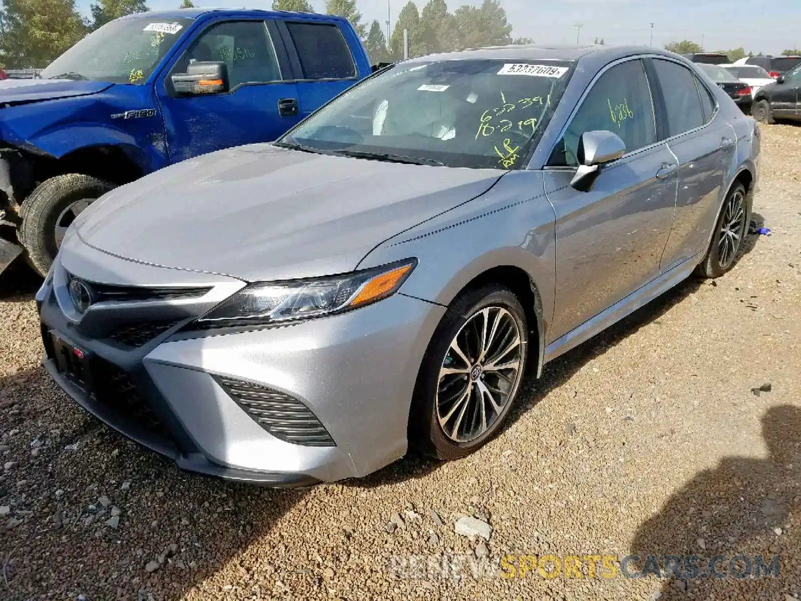 2 Photograph of a damaged car 4T1B11HK7KU195121 TOYOTA CAMRY 2019