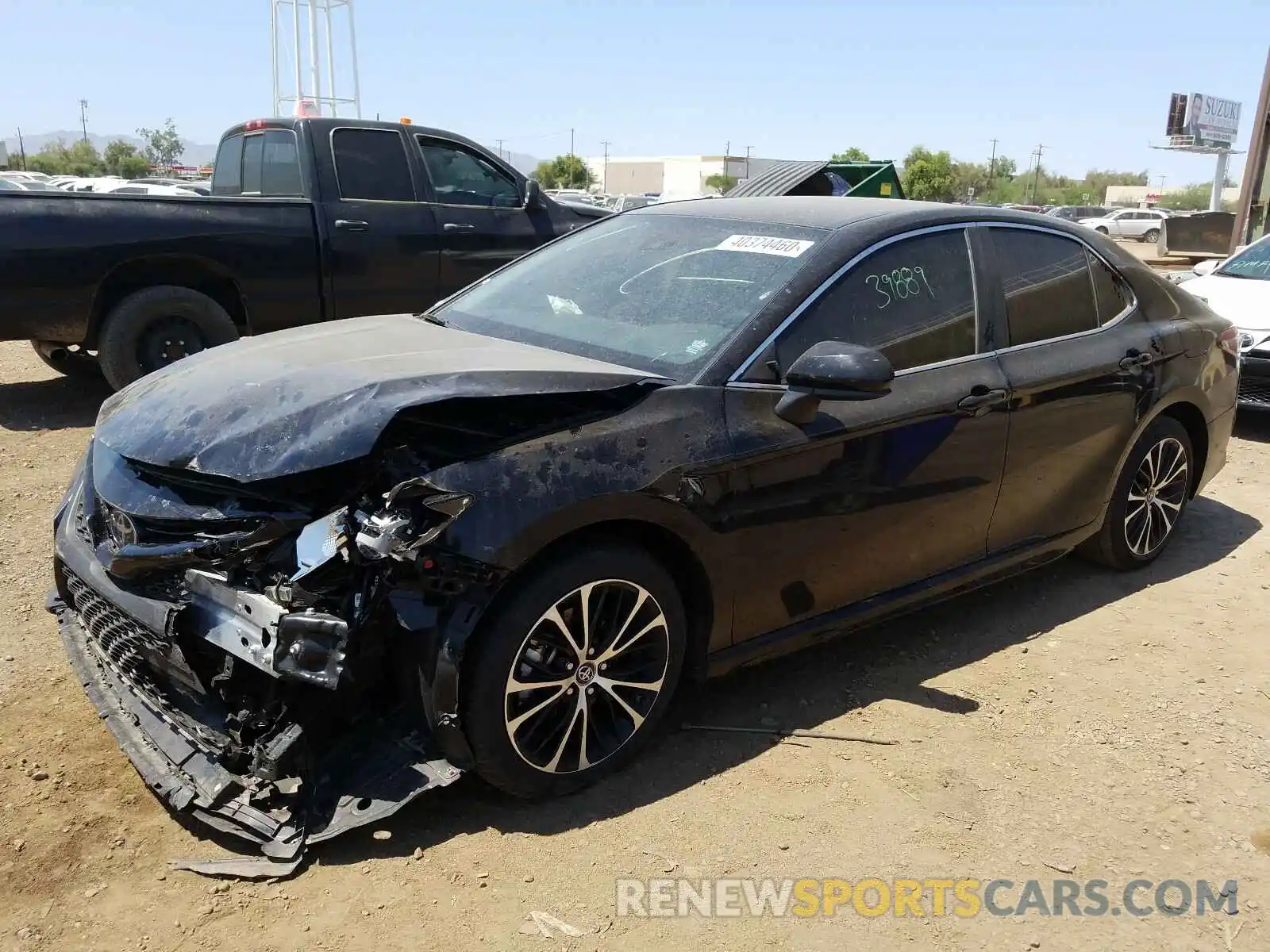 2 Photograph of a damaged car 4T1B11HK7KU199301 TOYOTA CAMRY 2019