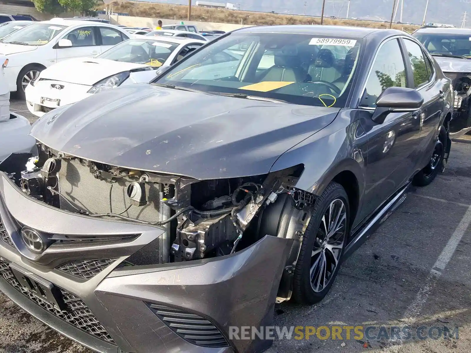 2 Photograph of a damaged car 4T1B11HK7KU199380 TOYOTA CAMRY 2019