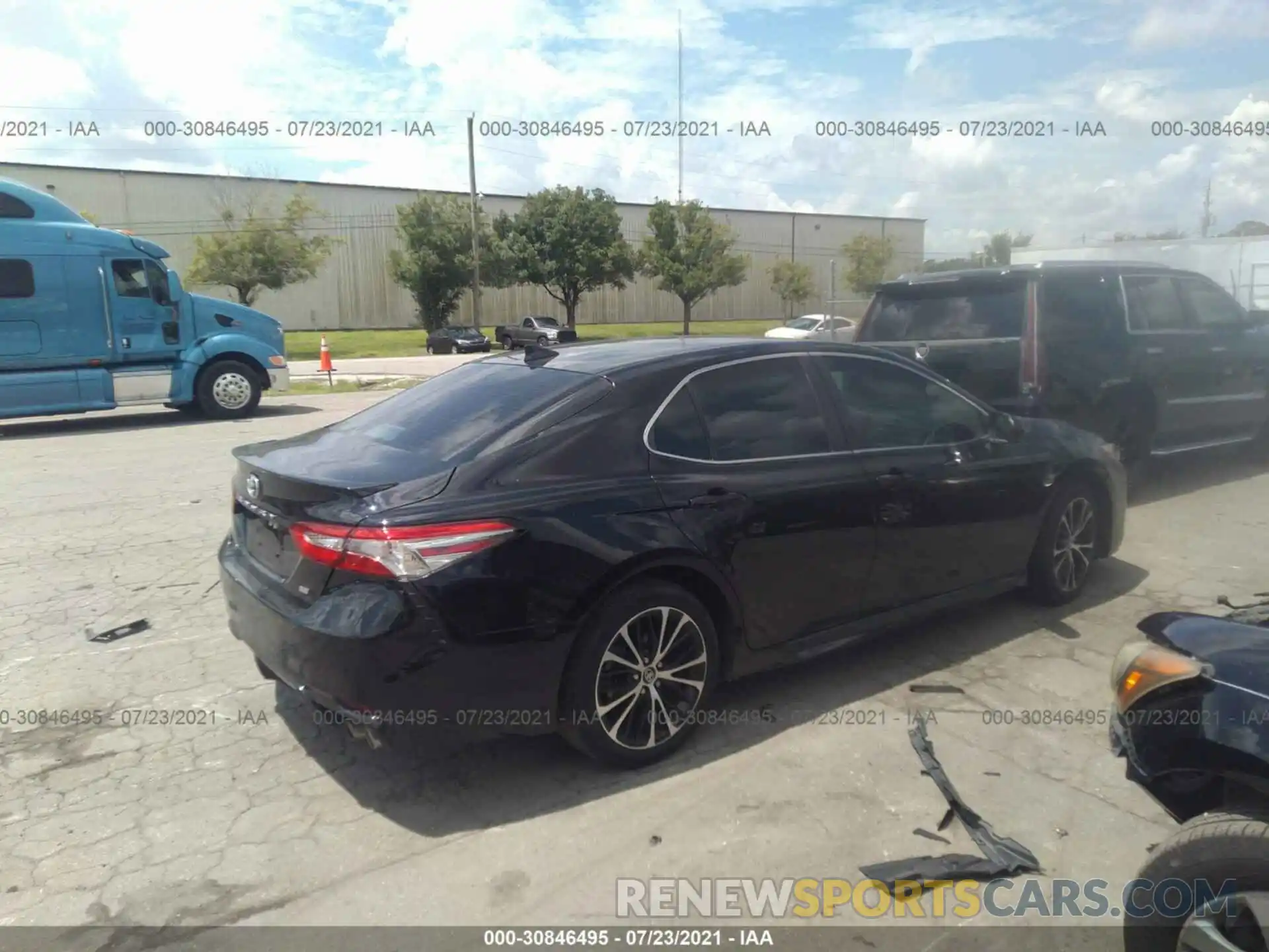 4 Photograph of a damaged car 4T1B11HK7KU200379 TOYOTA CAMRY 2019