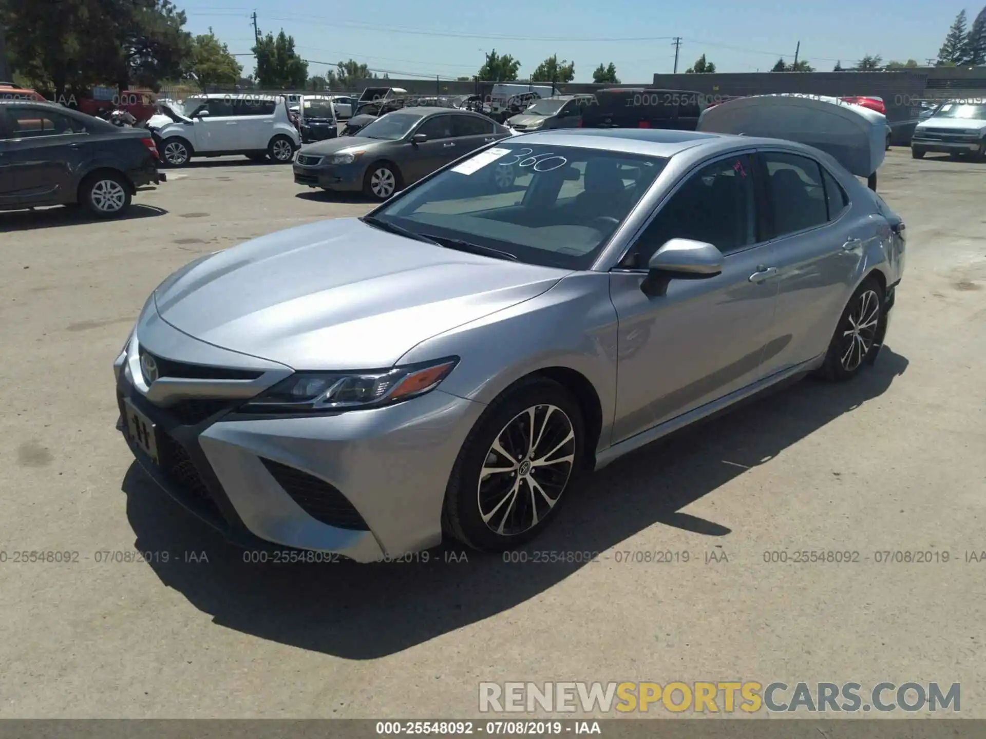 2 Photograph of a damaged car 4T1B11HK7KU201371 TOYOTA CAMRY 2019