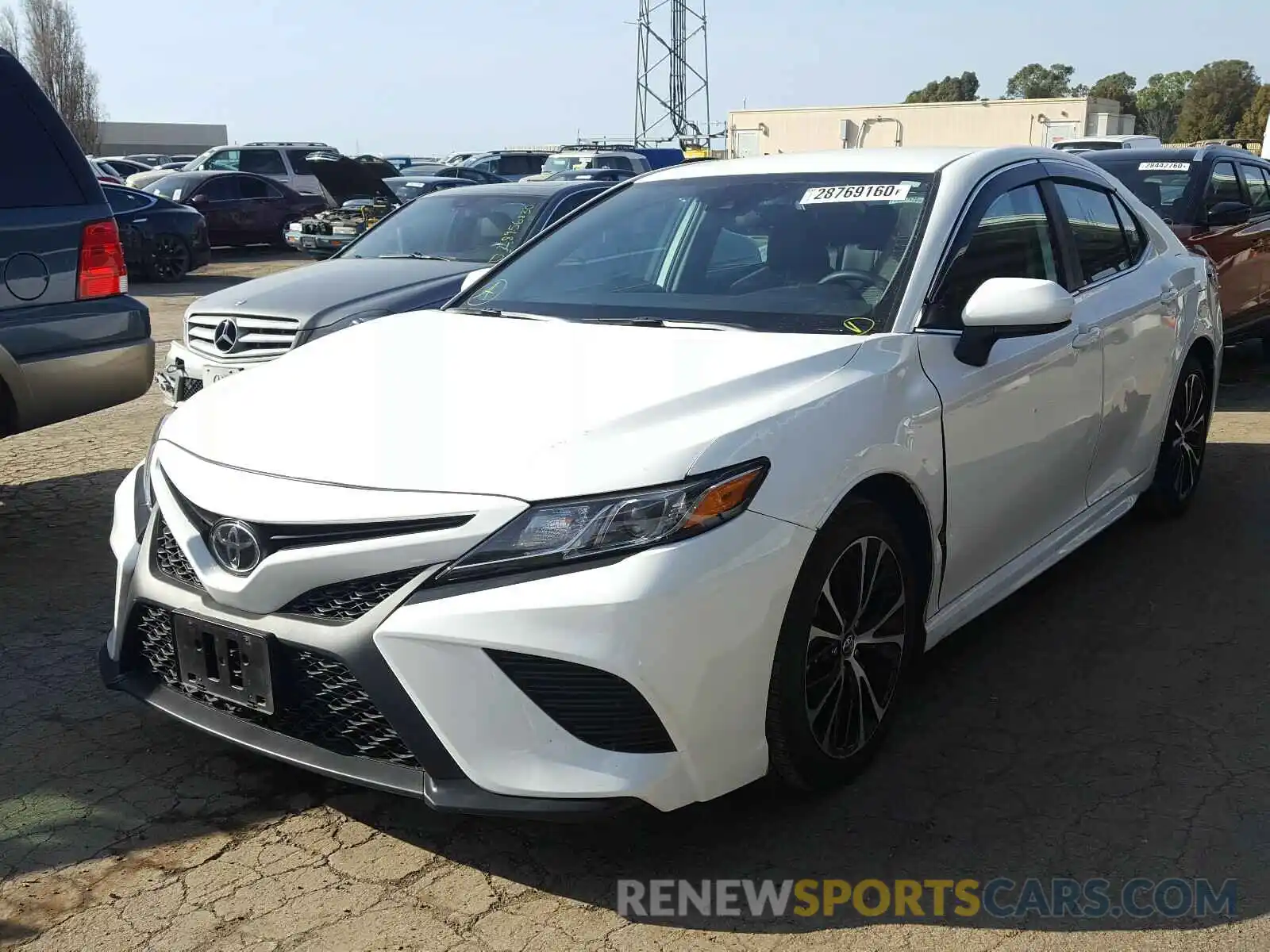 2 Photograph of a damaged car 4T1B11HK7KU203234 TOYOTA CAMRY 2019