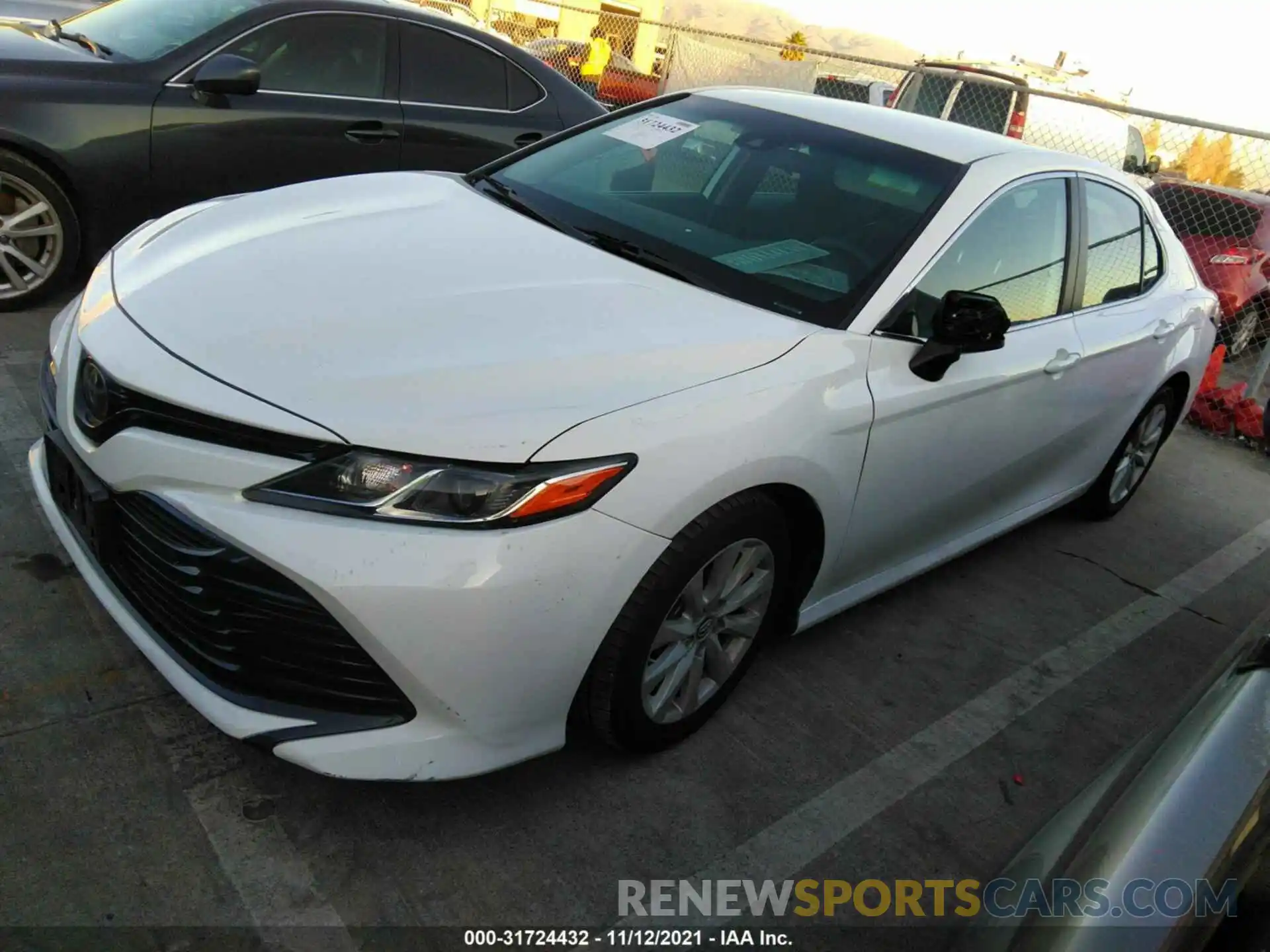 2 Photograph of a damaged car 4T1B11HK7KU205856 TOYOTA CAMRY 2019